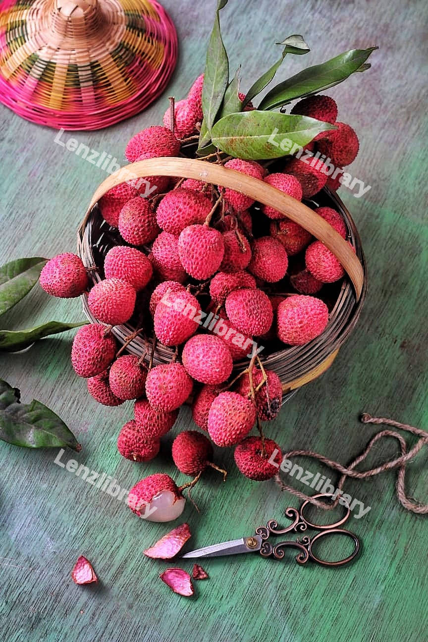 Lychee fruit placed in a basket